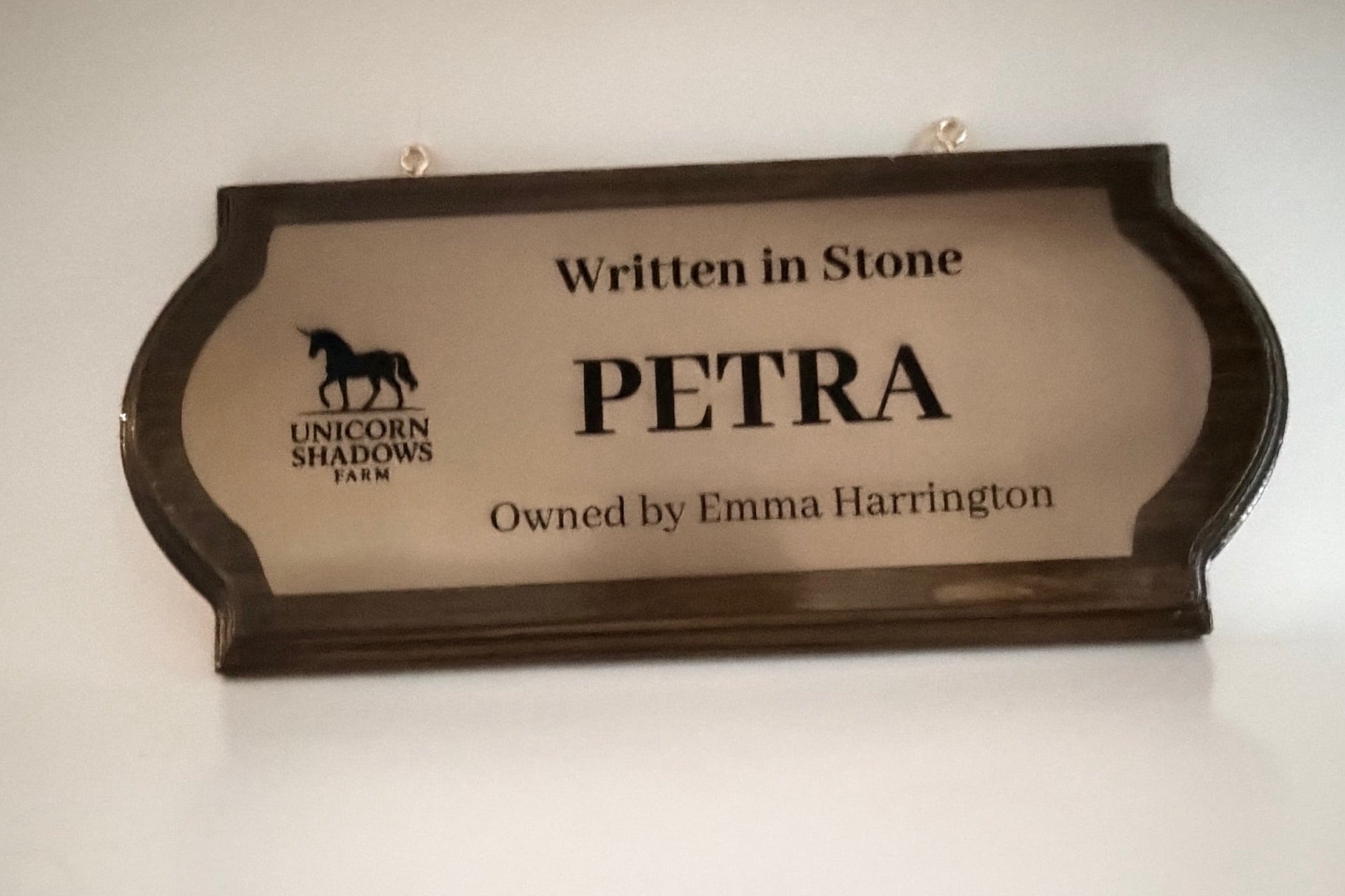 Wood and brass hanging stall sign